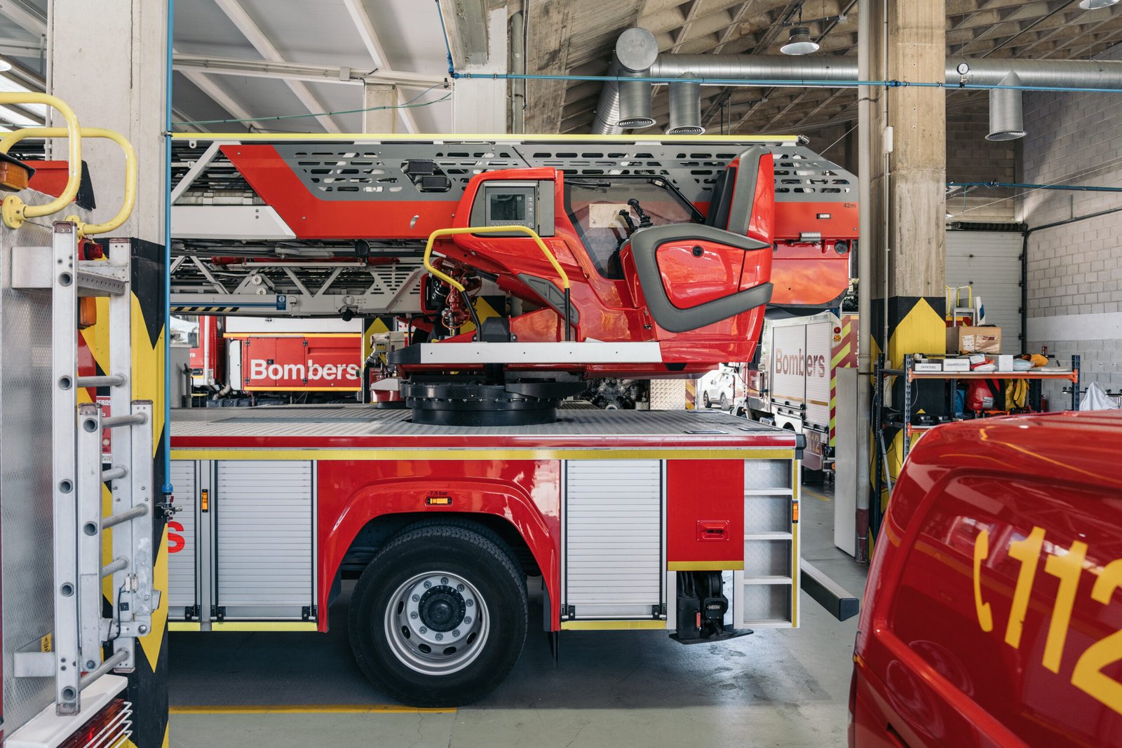 Modern fire truck parked inside fire station garag 2026 02 21 23 42 29 utc scaled